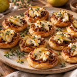 Caramelized onion pear and goat cheese tartlets