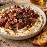 Whipped ricotta with roasted grapes, hot honey, and crostini
